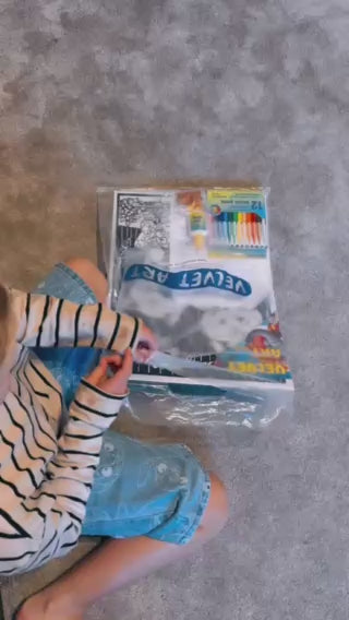 Load video: Getting going on a velvet art colouring board
